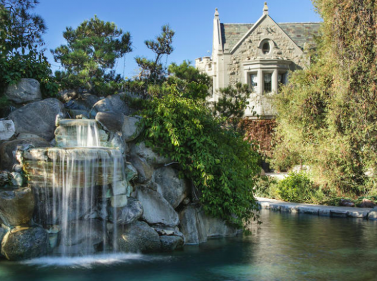 Greek American buys famous Playboy Mansion from Hefner