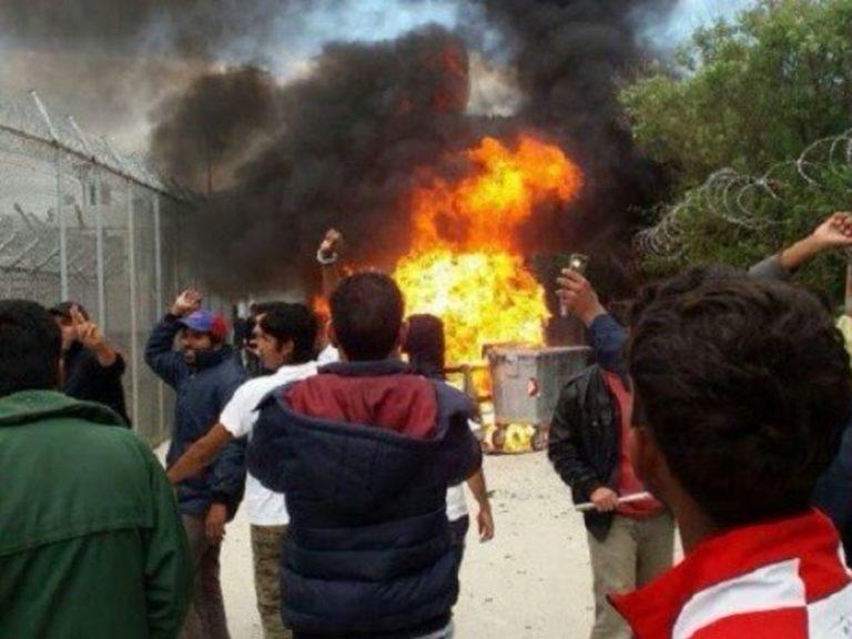 Refugees set Lesvos camp on fire, attack firefighters and police