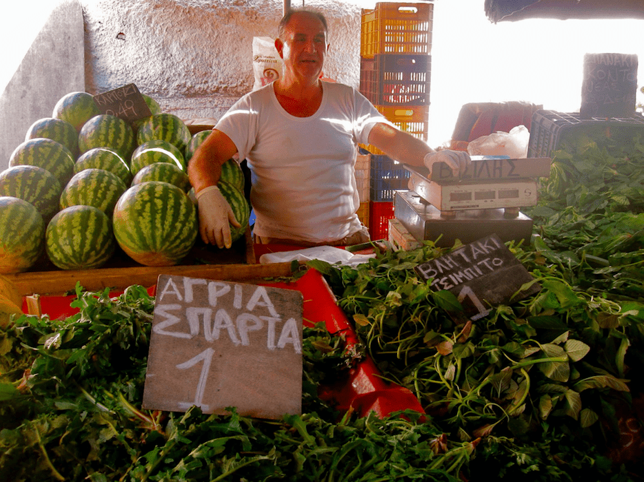A seller at the Greek Laiki, image courtesy of Gina Lionatos