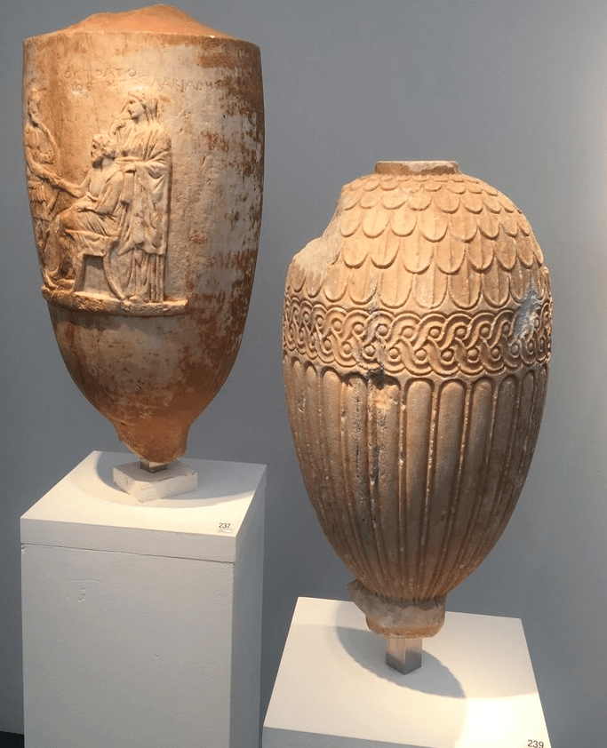 Two marble funerary vessels