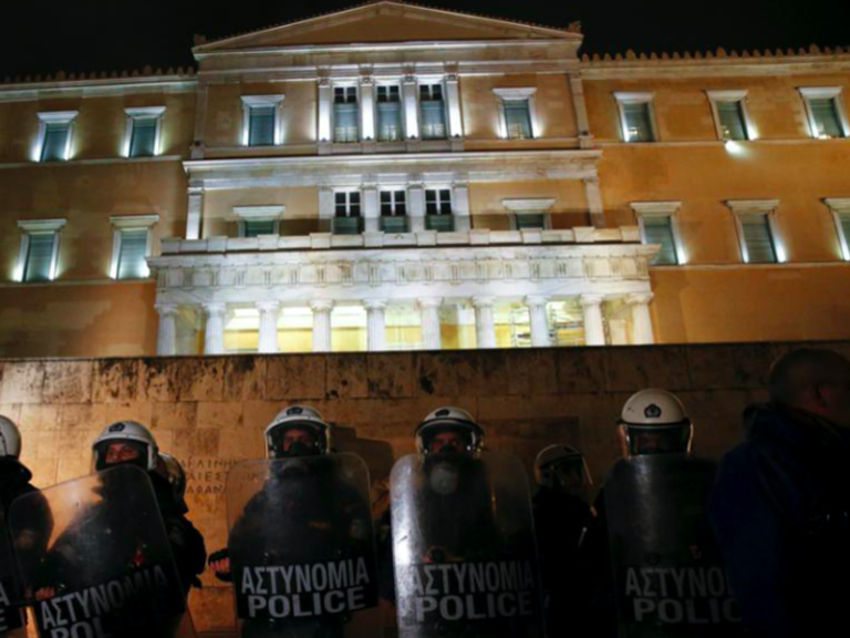Greek Parliament approves new package of bailout reforms amid reactions  