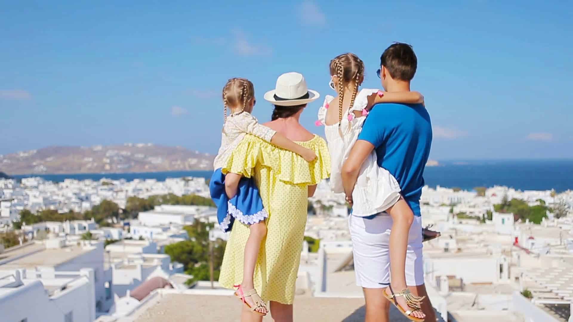 family in europe parents and kids background the old town in mykonos island greece brrvzr7t thumbnail full01