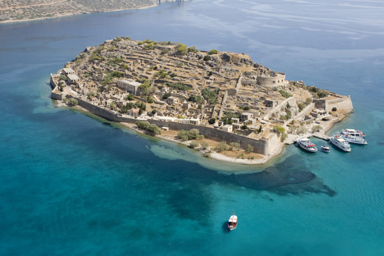 The amazing island of Spinalonga Crete had a Dark history