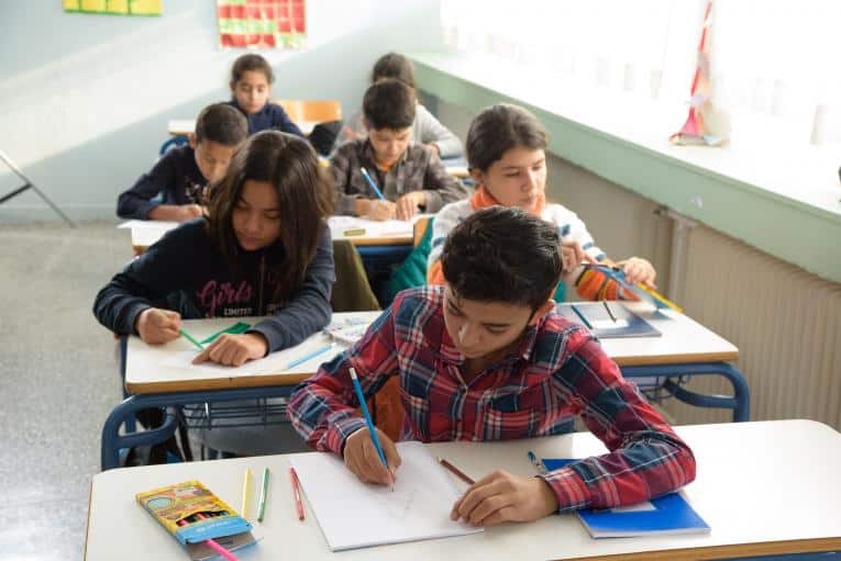 More than 12,000 refugee children attended Greek public schools