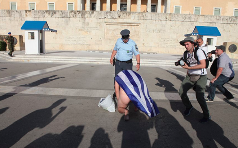 Naked man parades around Tomb of Unknown Soldier during Athens Pride 2019