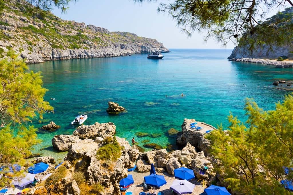 Overlooking the beautiful beach at Anthony Quinn Bay Rhodes Greece Europe min