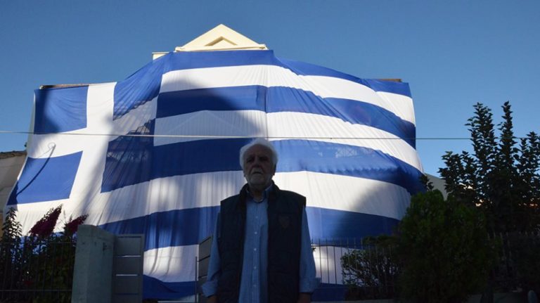 Deputy Mayor proudly drapes entire home with giant Greek flag to celebrate ‘Oxi Day’
