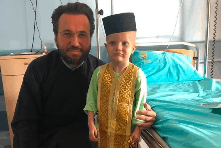 Greek Priest makes dream come true for little boy battling cancer