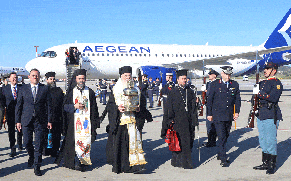 Holy Fire arives in Athens via Aegean Airlines
