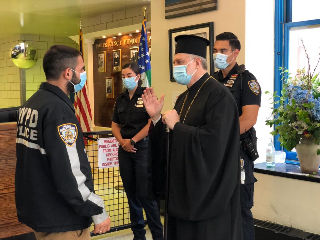 His Eminence Archbishop Elpidophoros of America visits local police precinct
