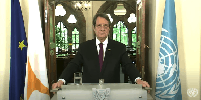 Cyprus is committed to resuming peace talks but not at gunpoint, says President Anastasiades