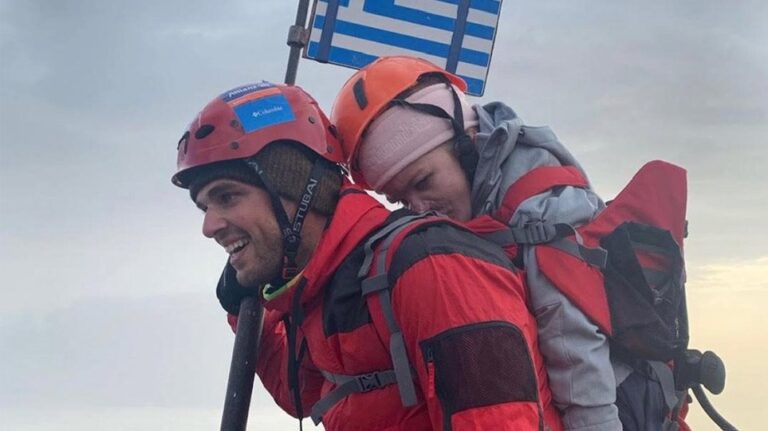 Greek athlete carries disabled student to the peak of Mount Olympus