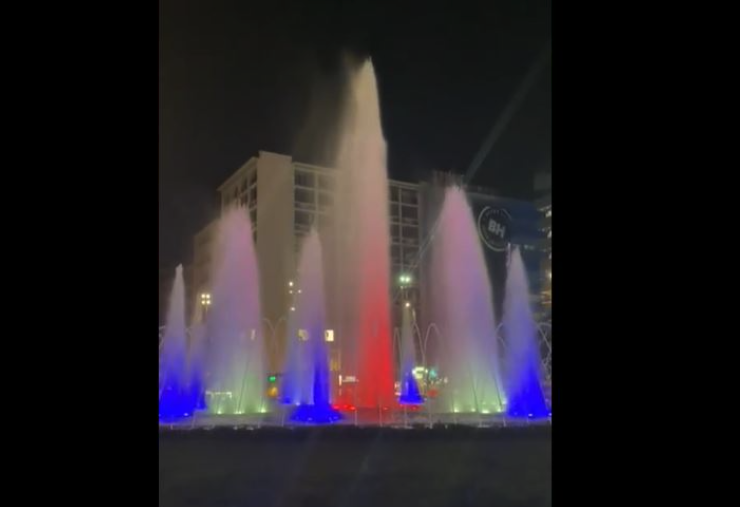 Omonia Square fountain lights up in blue, white and red in solidarity with France