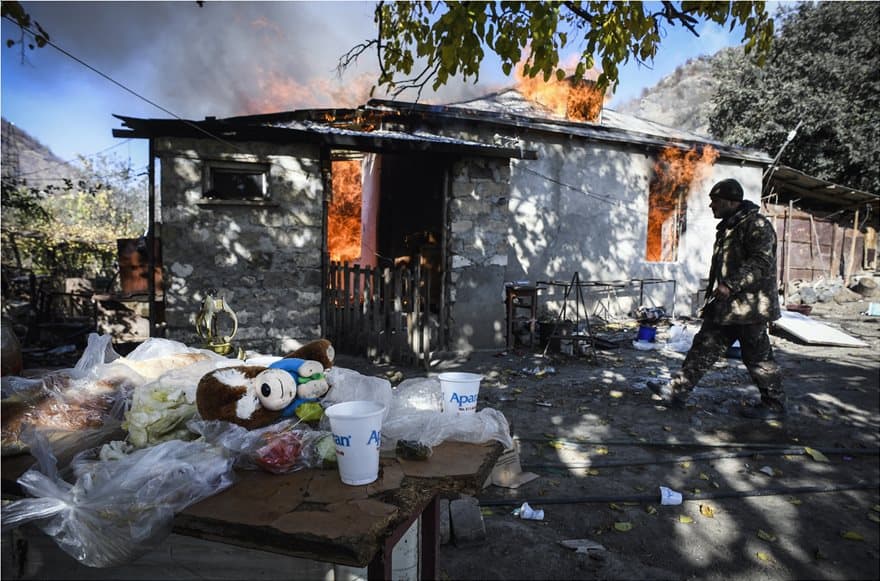 Armenians burning their homes in Artsakh.