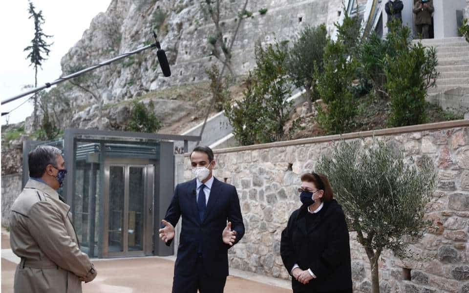 Greek Prime Minister Kyriakos Mitsotakis opening new wheelchair lift at Acropolis Hill.