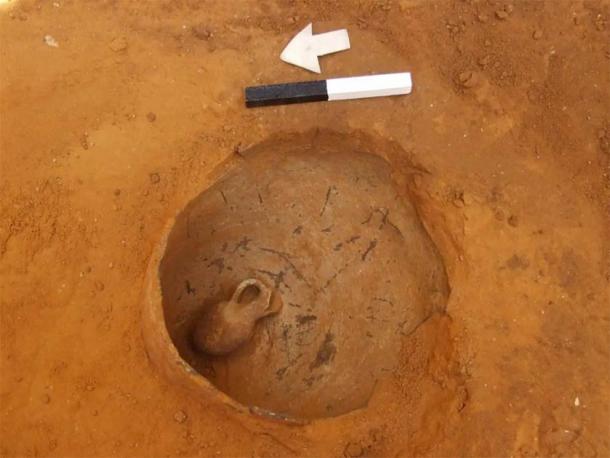 A jar in which a baby had been buried, lying inside a jug, in a Middle Bronze Age II funerary context.