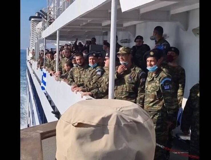 Footage of soldiers singing the Greek National Anthem as they approach Kastellorizo. (not Rhodes)