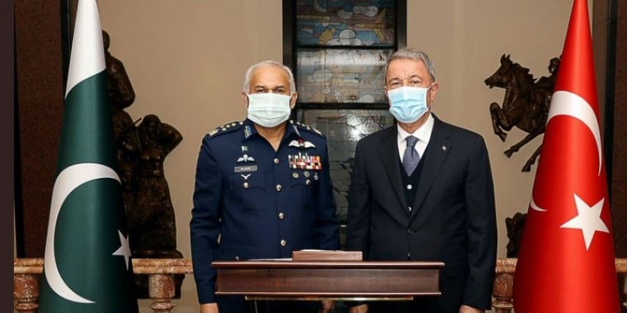 Pakistan Air Force chief, General Mujahid Anwar Khan, with Turkey's so-called Defense Minister, Hulusi Akar.