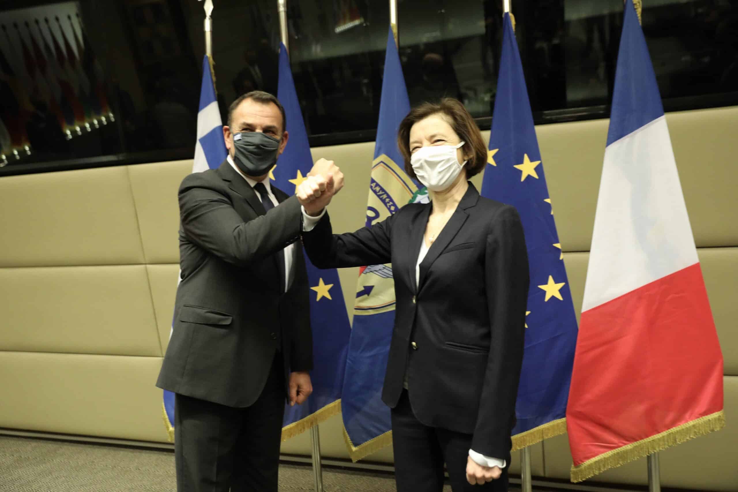 Greek Defense Minister Nikos Panagiotopoulos with his French counterpart Florence Parly.