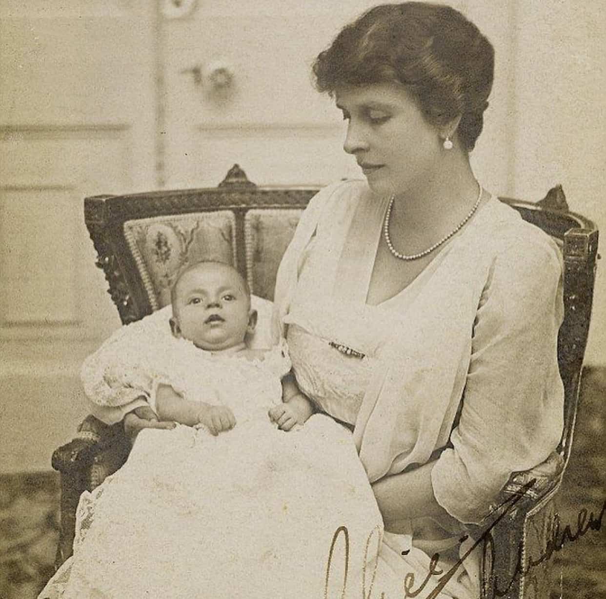 Prince Philip of Greece held by his mother Princess Alice of Denmark