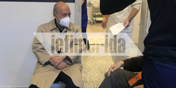 Former Greek PM Costas Simitis waits in line for Covid-19 vaccine