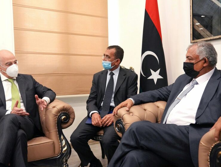 Nikos Dendias with Libyan Deputy Prime Minister Hussein Atiya Abdul Hafeez Al Qatrani in Benghazi on April 12, 2021.