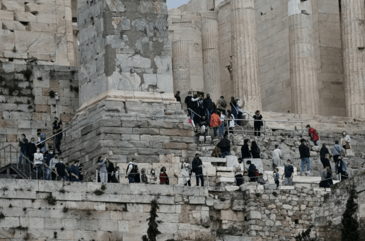 Visitors Wait In Long Queues To Visit The Acropolis On ...