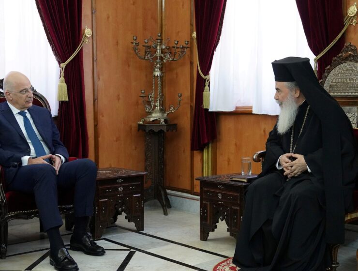 Greek Foreign Minister Nikos Dendias with Greek Orthodox Patriarch of Jerusalem Theophilos III in Jerusalem on May 18, 2021.