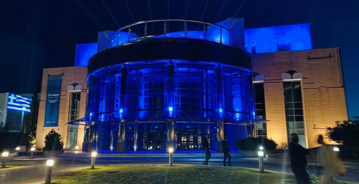 Thessaloniki Concert Hall lit up in colours of Greek flag