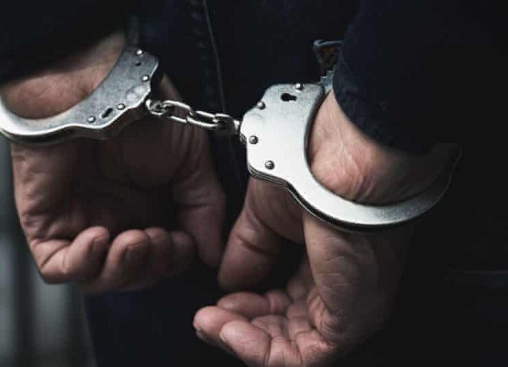 arrested handcuffs interpol australia Athens Albanian