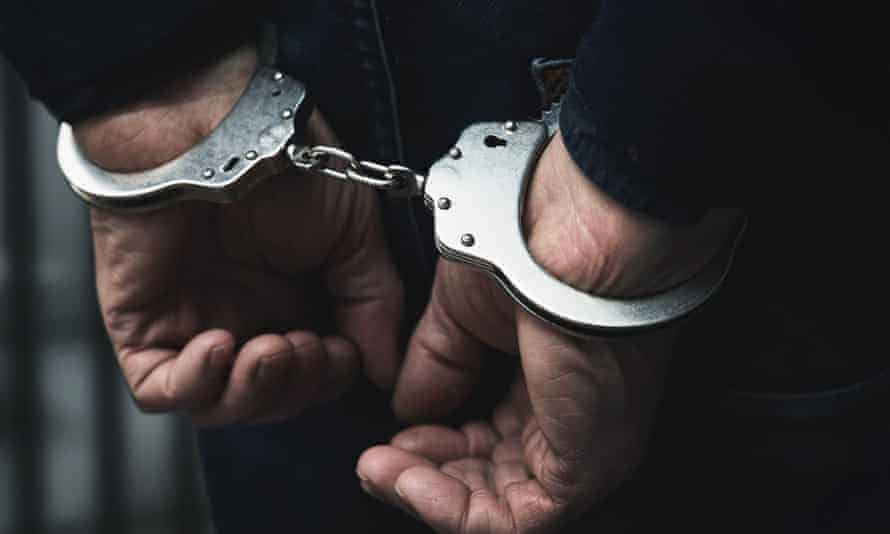 arrested handcuffs crete greek police kos
