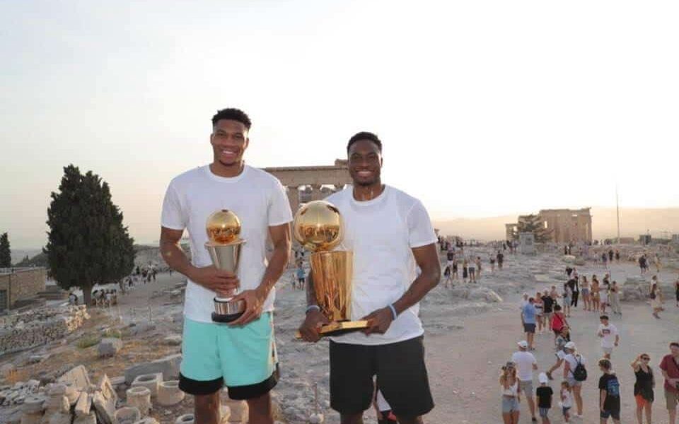Antetokounmpo brothers climb Acropolis and stand before the Parthenon holding their NBA trophies 1