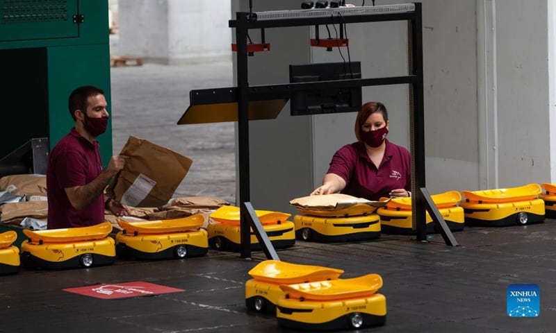 EUROPEAN FIRST: 55 Chinese robots sort out Greek mail at Hellenic Post 1