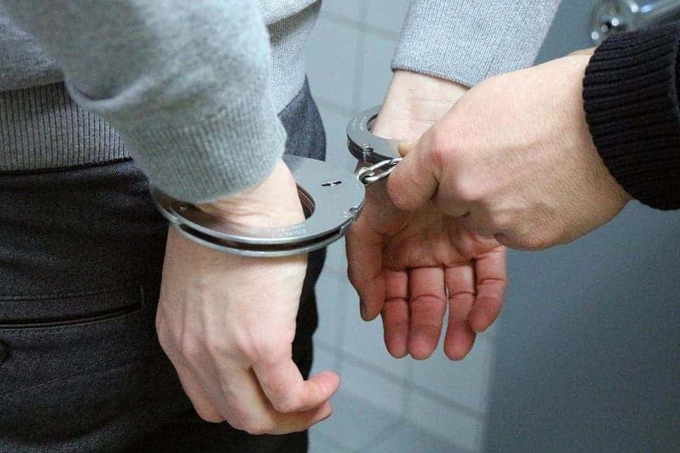 school handcuffs arrested foreigners