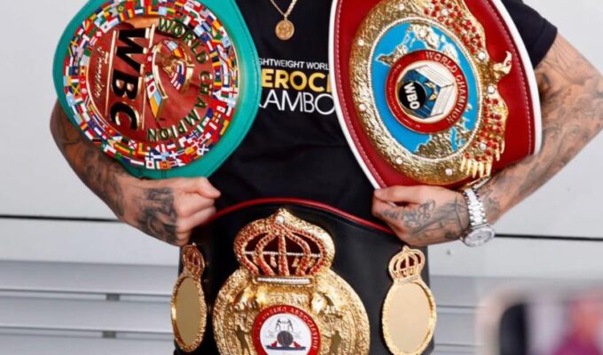 Kambosos lands in Sydney with his belts