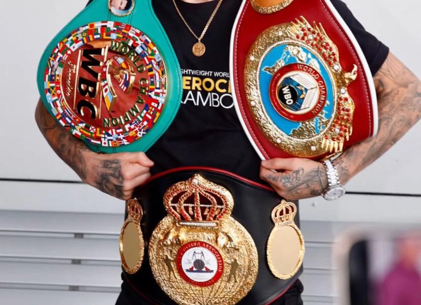 Kambosos lands in Sydney with his belts
