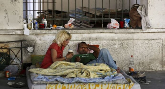 Athens provides heated shelters for the homeless as bad weather batters Greece