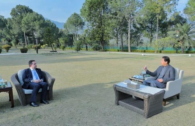 Prime Minister Imran Khan during a meeting with Greek minister Panagiotis Mitarachi in Islamabad on February 7, 2022. PHOTO: APP greek government