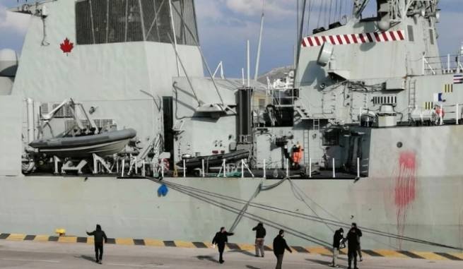 NATO ships in the port of Piraeus attacked with red paint 3