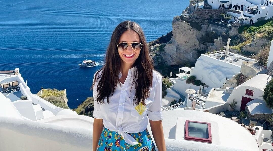 Nina Dobrev shows off her toned figure in a blue swimsuit as she enjoys a romantic Santorini getaway