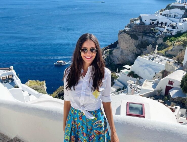 Nina Dobrev shows off her toned figure in a blue swimsuit as she enjoys a romantic Santorini getaway