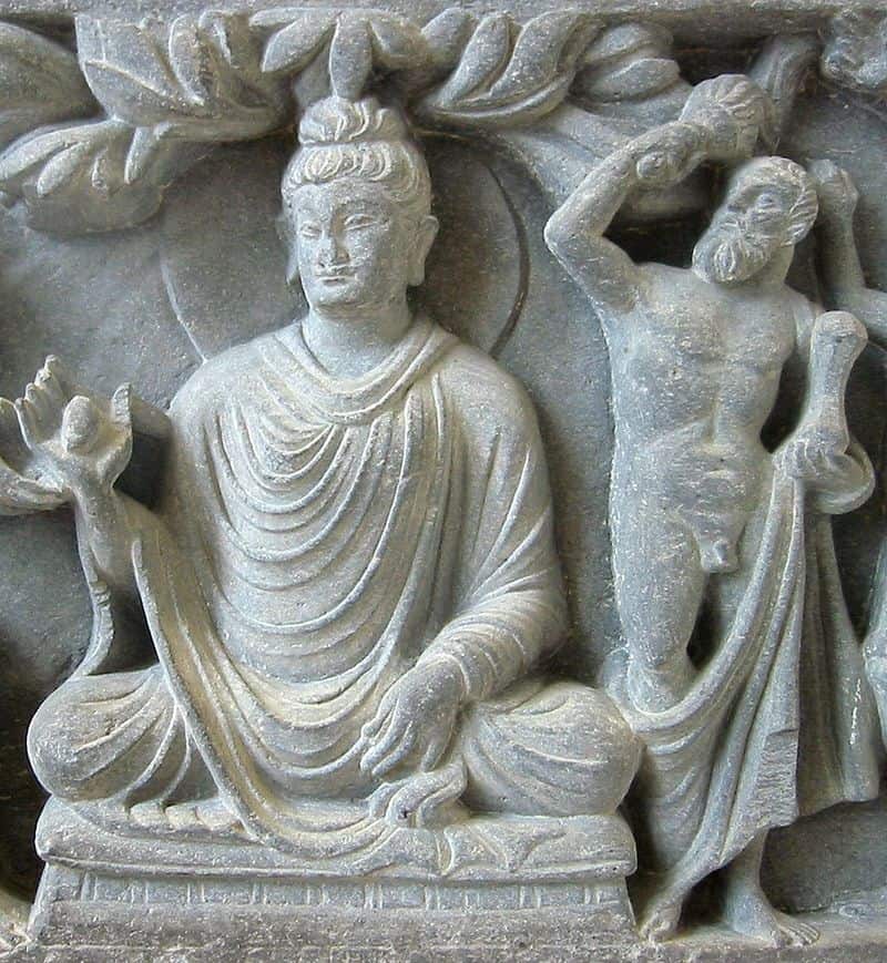Herculean depiction of Vajrapani (right), as the protector of the Buddha, 2nd century AD Gandhara, British Museum.