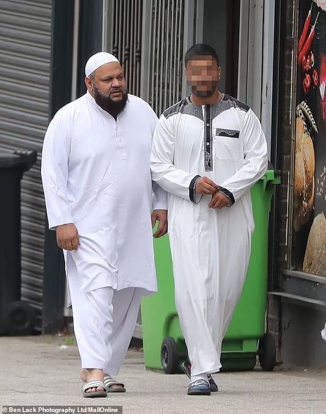 Rotherham grooming gang member Qurban Ali (left) has been pictured taking a stroll in Sheffield after his release from jail, just miles from where his crimes took place