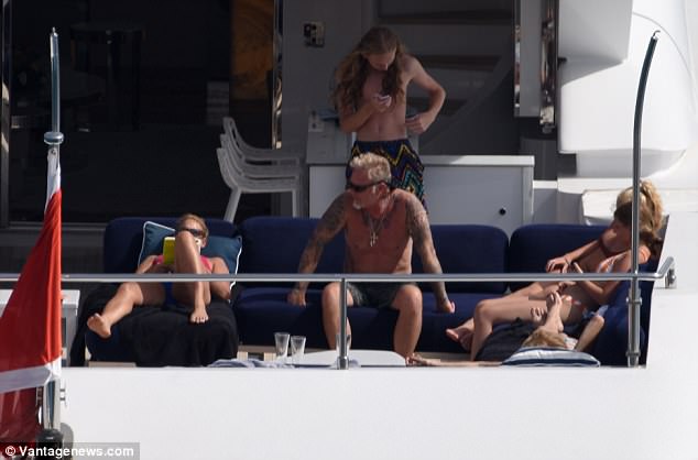 This is the life! The family looked in their element as they topped up their tans on the sun deck