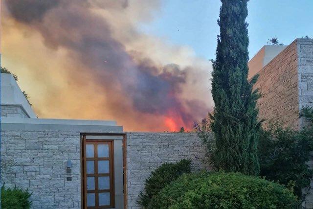 two arrested in connection with amanzoe fire