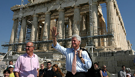 Bill Clinton waves, while visiting the Acropolis, 2007