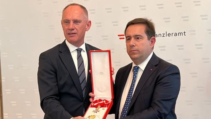Austria awards Greek minister country's highest honour over handling of migration crisis
