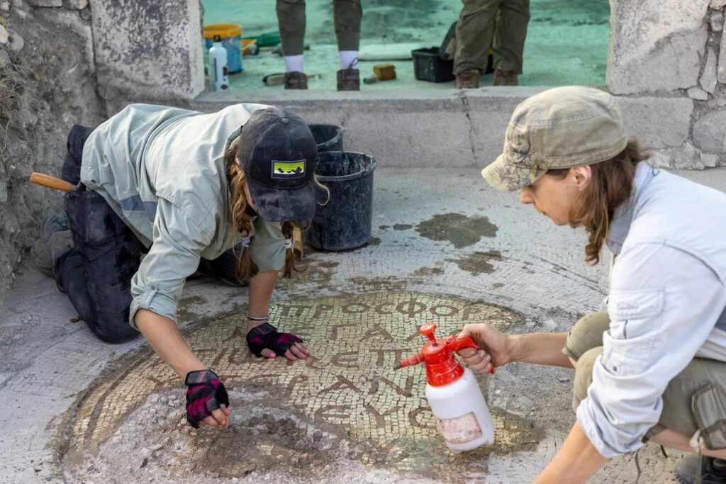 Exposing the medallion inscription in the narthex at the Martyrion of Theodoros.Credit: Michael Eisenberg