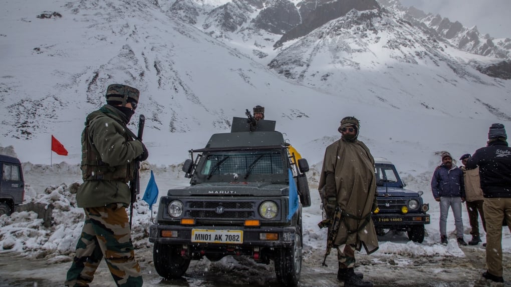 Indian army soldiers stand guard at the snow-cleared Srinagar-Leh highway on March 19, 2022 in Zojila. Photo used for representation purpose only. (Photo by Yawar Nazir/Getty Images)