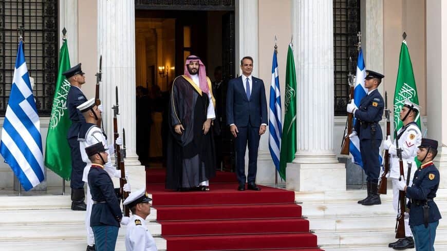 Greek prime minister Kyriakos Mitsotakis and Saudi Crown Prince Mohammed bin Salman listen to the national anthems prior to their meeting at the prime minister's office in Athens on July 26, 2022. - YORGOS KARAHALIS/AFP via Getty Images Read more: https://www.al-monitor.com/originals/2022/07/saudi-arabia-signs-energy-agreement-greece#ixzz7npRvrDTt